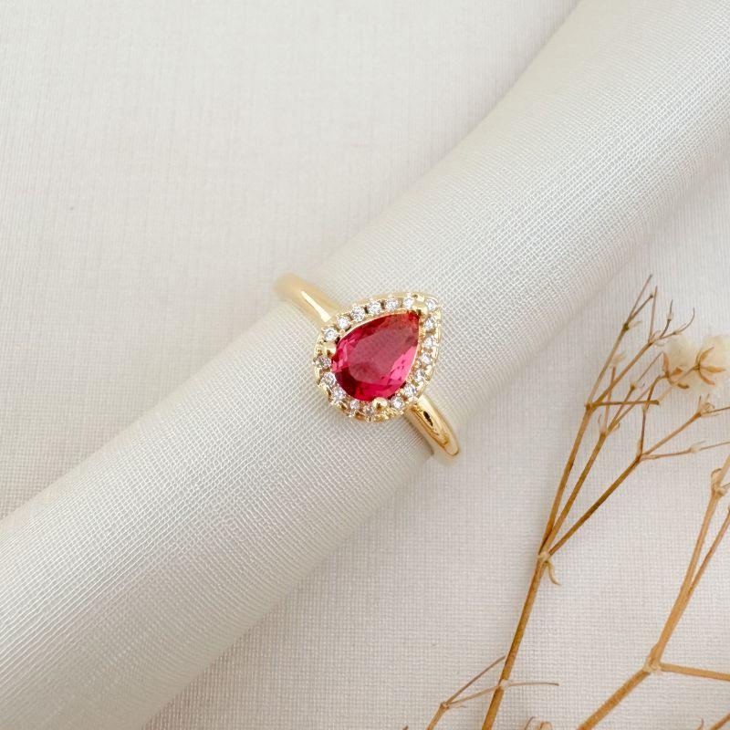 03.2457.6.O - (22) Anel solitário de gota em 11mm com uma linha de cravação em volta