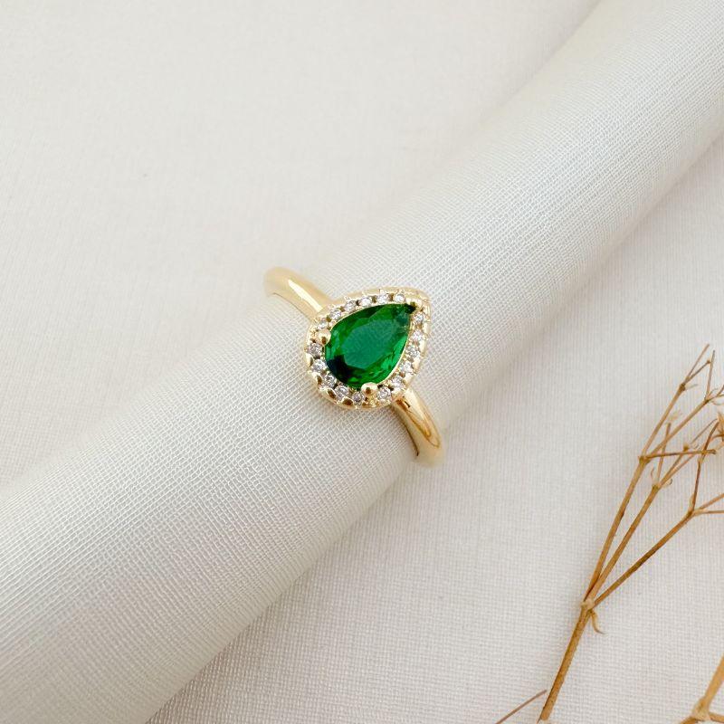 03.2457.5.O - (19) Anel solitário de gota em 11mm com uma linha de cravação em volta