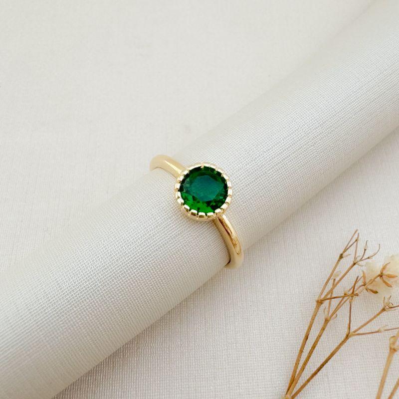 03.2459.5.O - (14) Anel de pedra circular com borda em spikes com aro liso