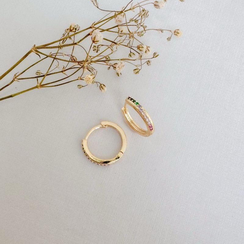 05.3042.C.O - (Tam. G) Argola circular com cravação frontal em uma coluna irregular