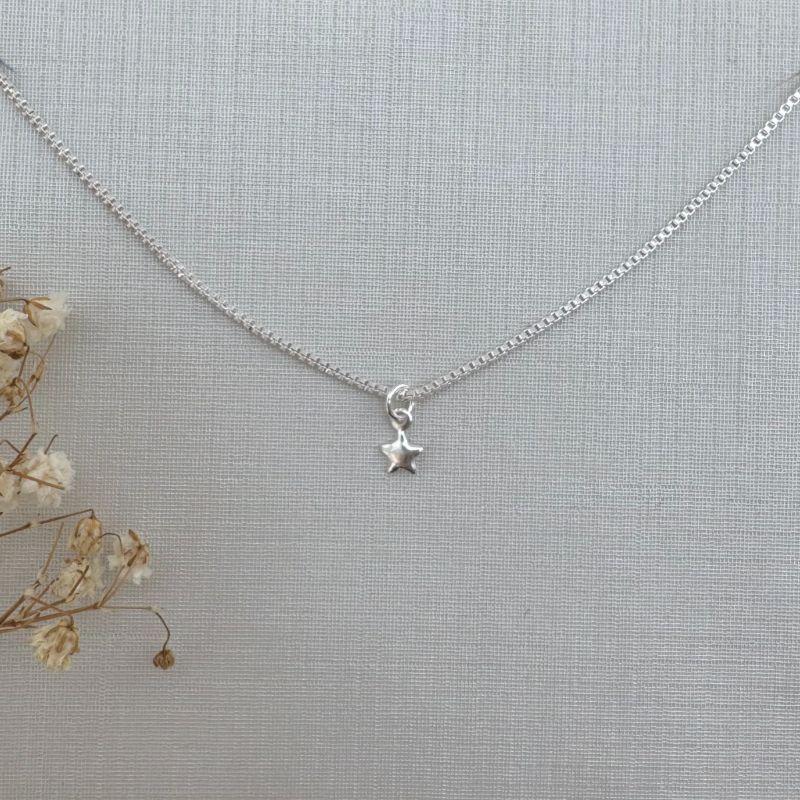 09.2315.1.S - (35) Colar infantil mini estrela chapada