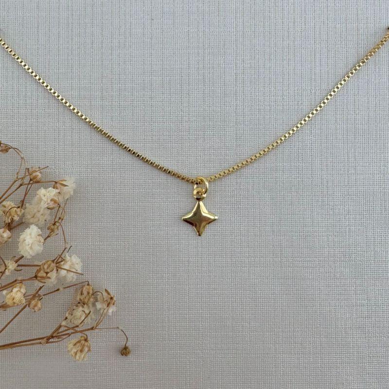 09.2316.1.O - (35) Colar infantil estrela lisa quatro pontas