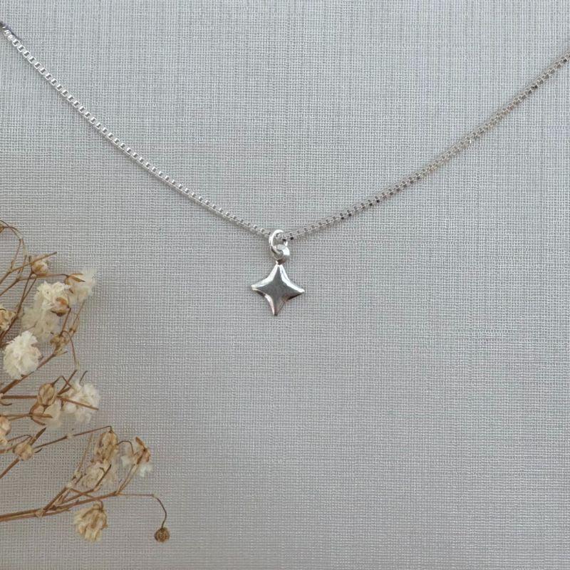 09.2316.1.S - (35) Colar infantil estrela lisa quatro pontas