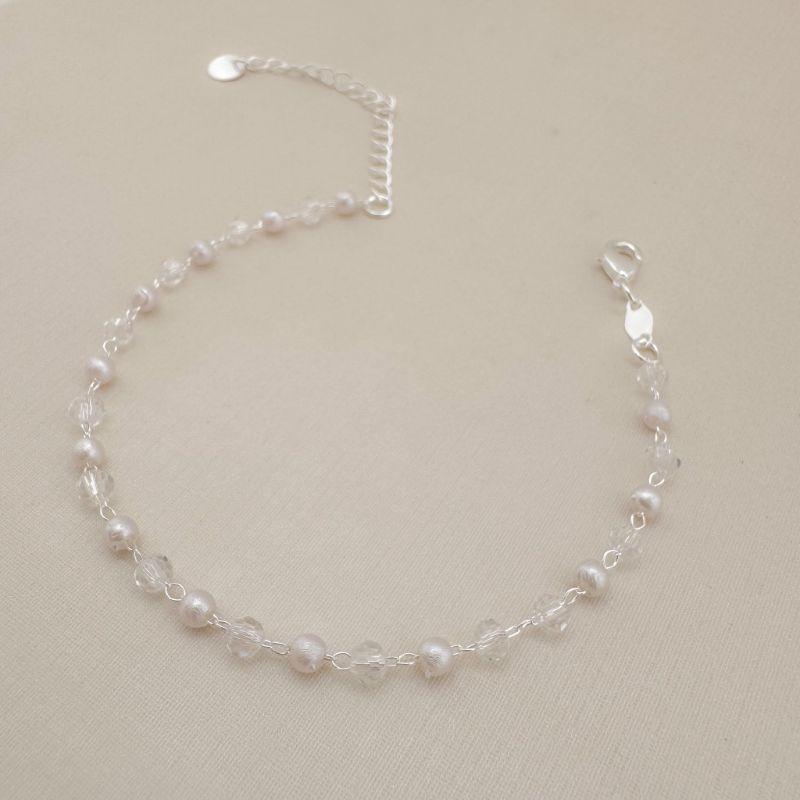 12.2113.15.S - Pulseira de bolinhas em resina pérola e resina cristal intercalados por inteiro