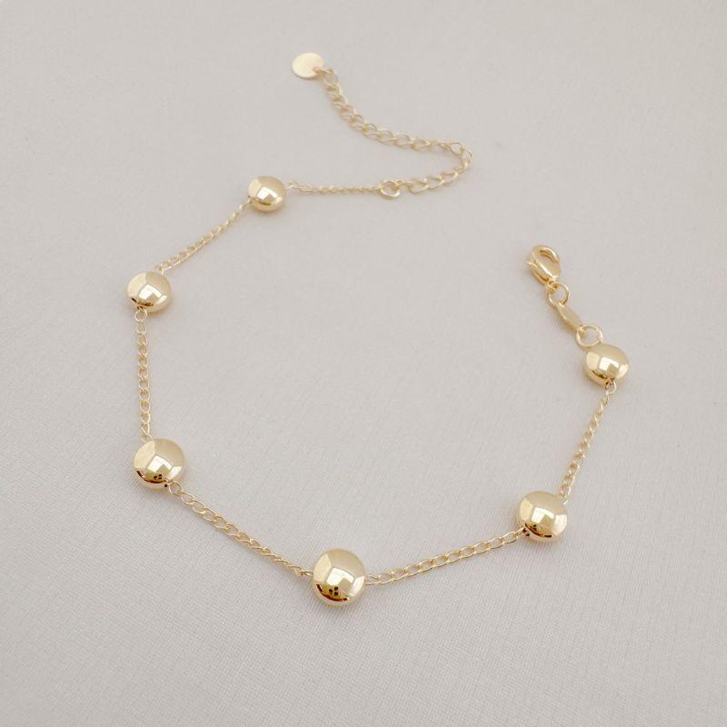 12.2116.0.O - Pulseira de elos simples com moedas lisas espaçadas