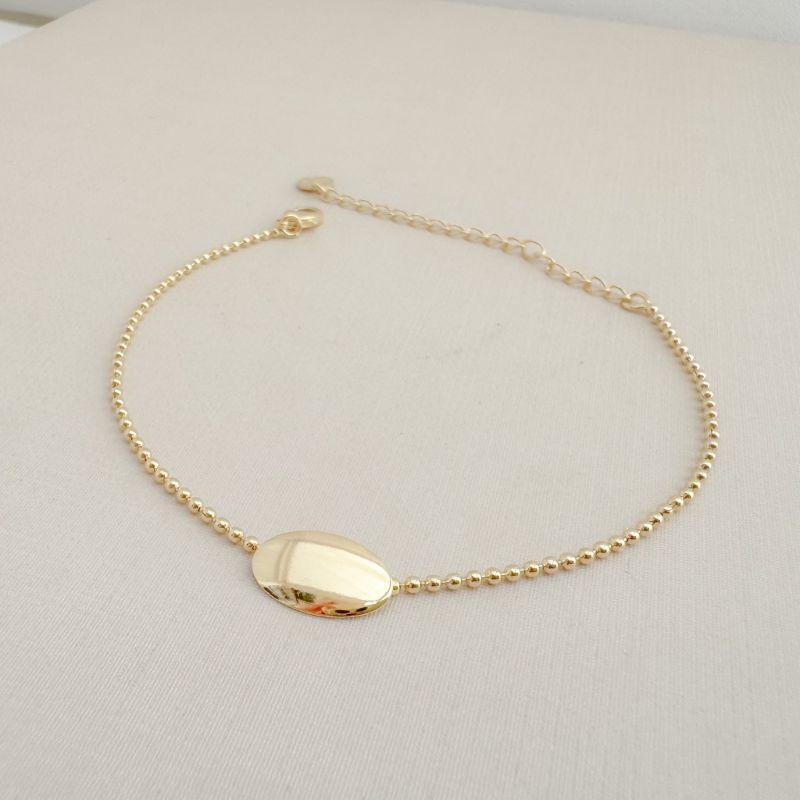 12.2215.0.O - Pulseira de bolinhas lisas com central em chapa oval lisa polida