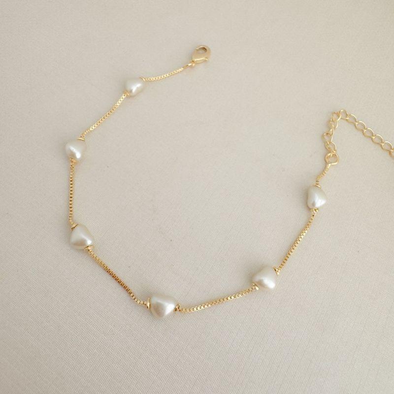 12.2219.15.O - Pulseira de veneziana com corações perolados espaçados