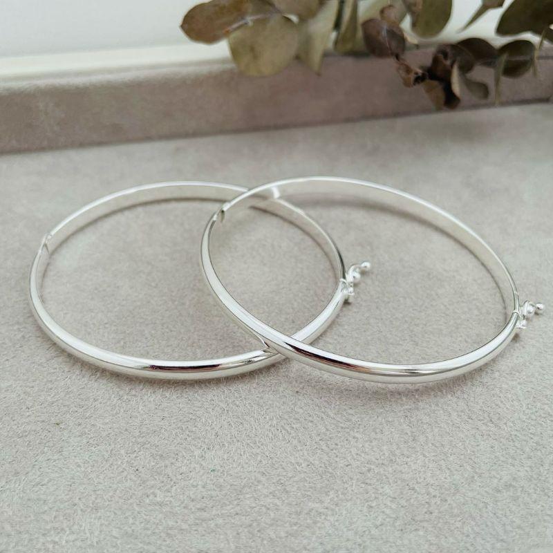 04.0194.0.S - Bracelete liso oval com dentro reto e efeito concavo