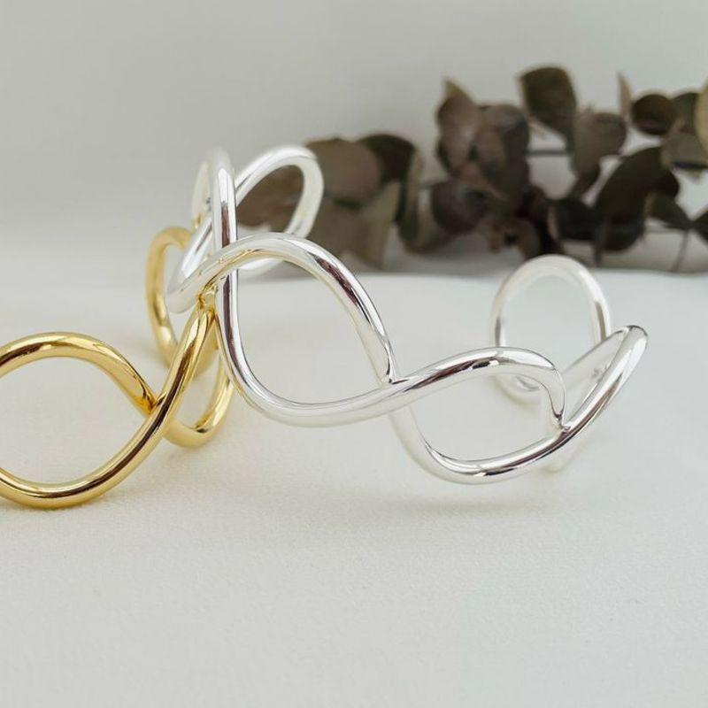 04.0195.0.S - Bracelete de tubo liso em efeitos infinitos