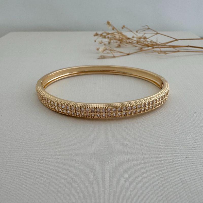 04.0204.1.O - Bracelete de duas linhas cravejadas com borda alta em efeito spikes