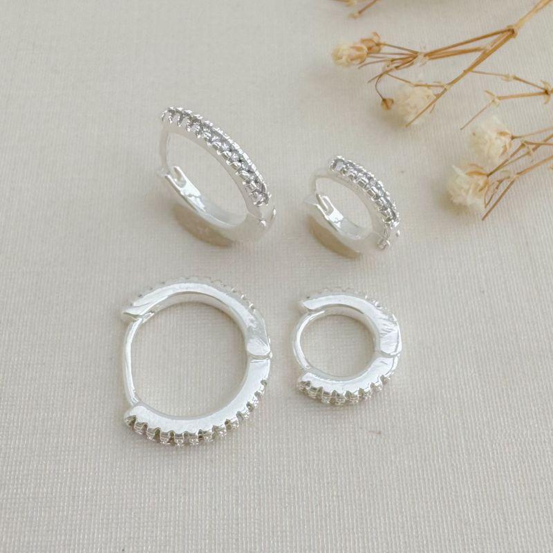 05.3075.1.S - Dupla de argolas de cravação frente e atrás em uma coluna com barras