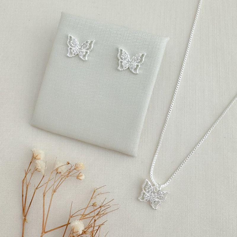 08.0611.1.S - (45) Conjunto de borboleta com central cravejada e borda espaçada em spikes