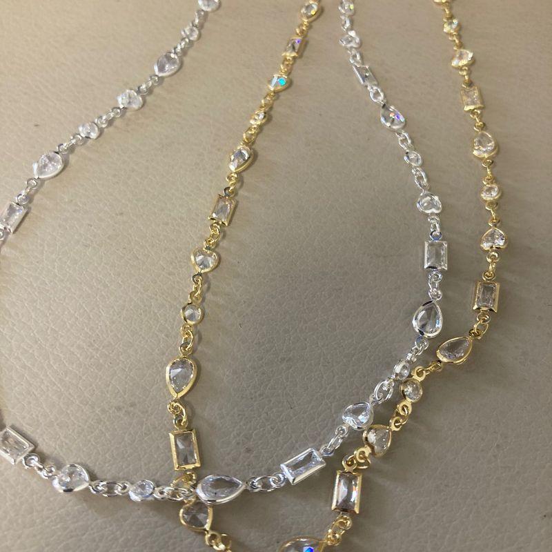 09.1999.1.O - (35) Choker de pedra variadas em cravação inglesa