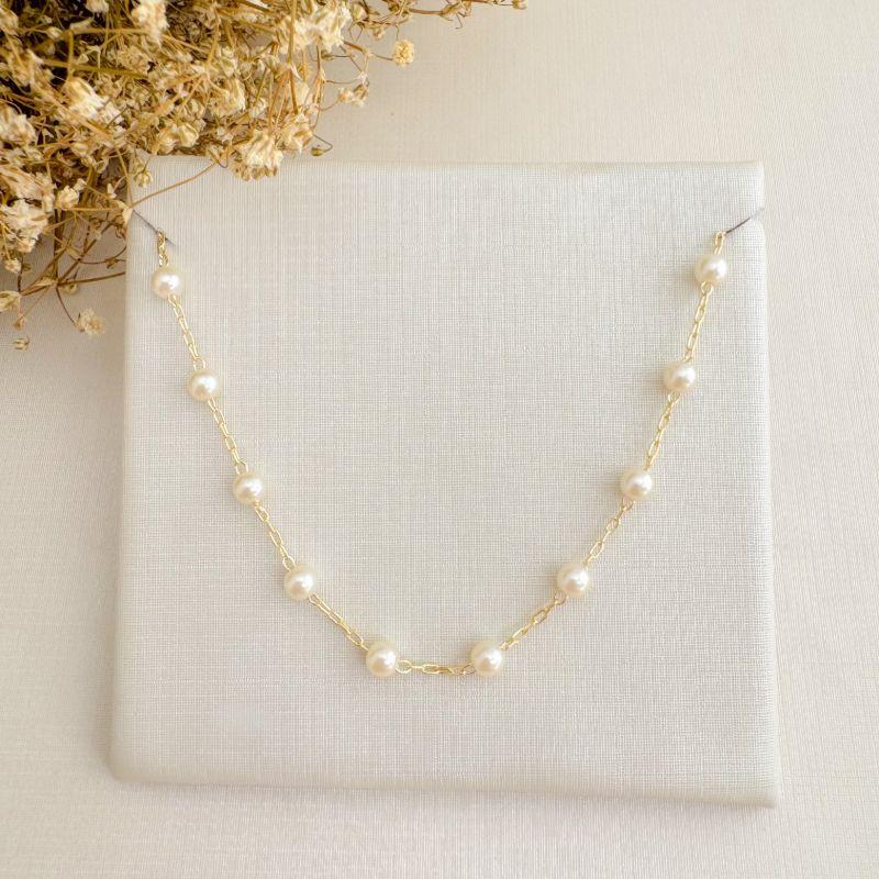 09.2358.15.O - (32) Colar de pérolas espaçadas em corrente cartier