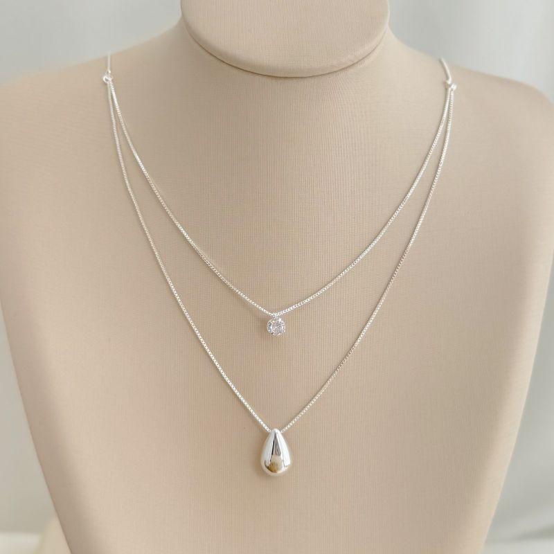 09.2370.1.S - (40) Colar duplo com ponto de luz e gota lisa