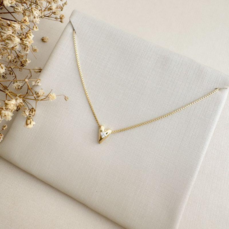 09.2375.1.O - (36) Colar com pingente de coração liso e mini ponto de luz no centro