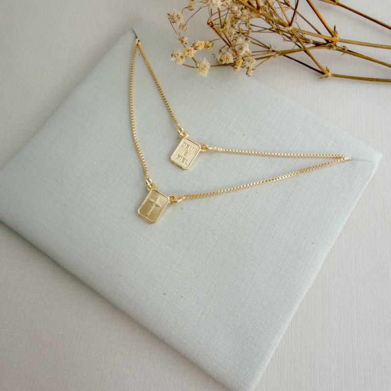 09.2410.0.O - (59) Escapulario de 8mm com imagem de cruz e peixe, cruz e Deus é Fiel