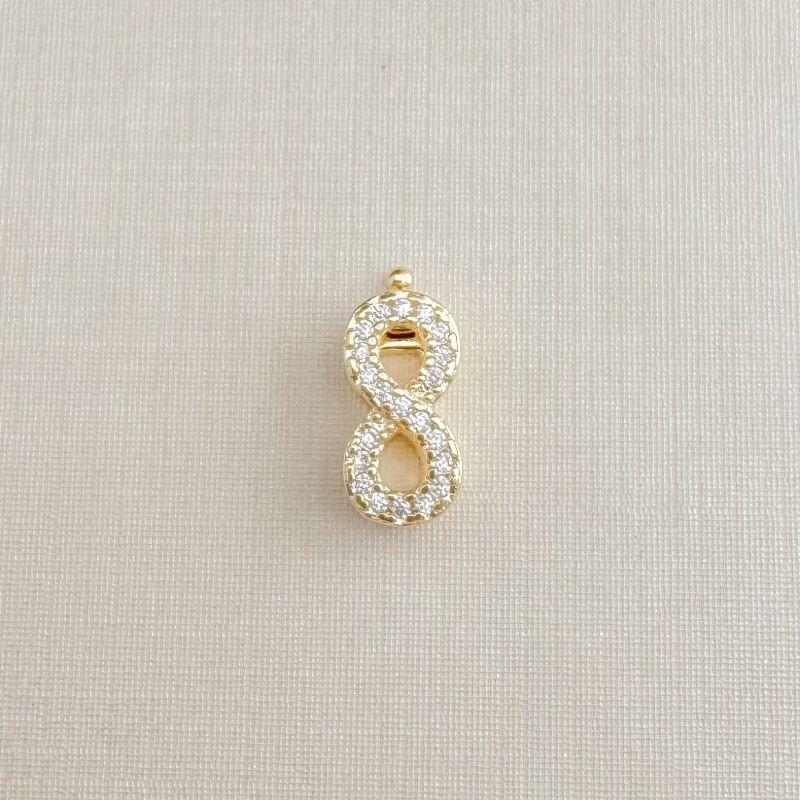 11.0607.1.O - Pingente de corrente de fita em formato infinito cravejado