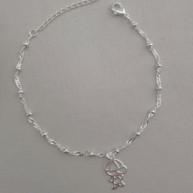 12.2132.1.S - Pulseira de malha singapura com bolinhas lisas e pingente de menino