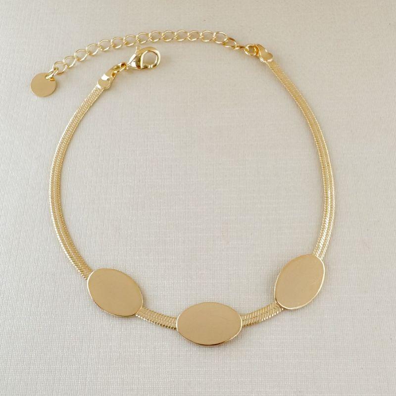 12.2232.0.O - Pulseira de malha fita com três chapas ovais lisas