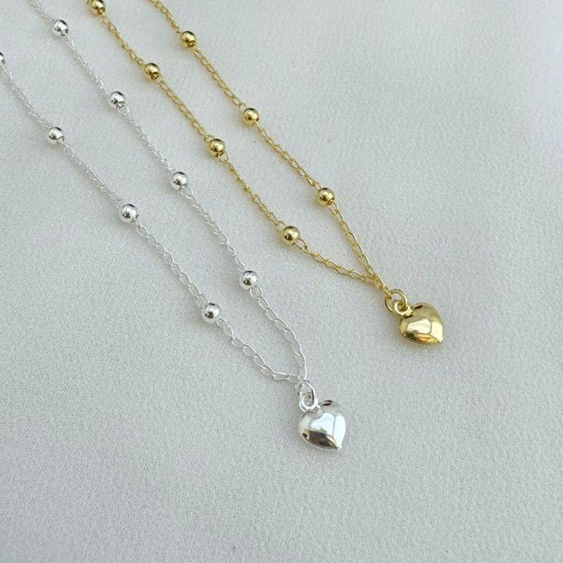 14.0282.0.O - Tornozeleira de bolas lisas com pingente de coração liso