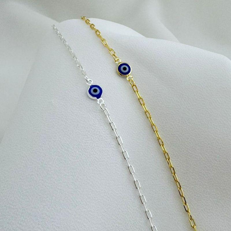 14.0286.20.S - Tornozeleira de elos quadrados com olho grego central