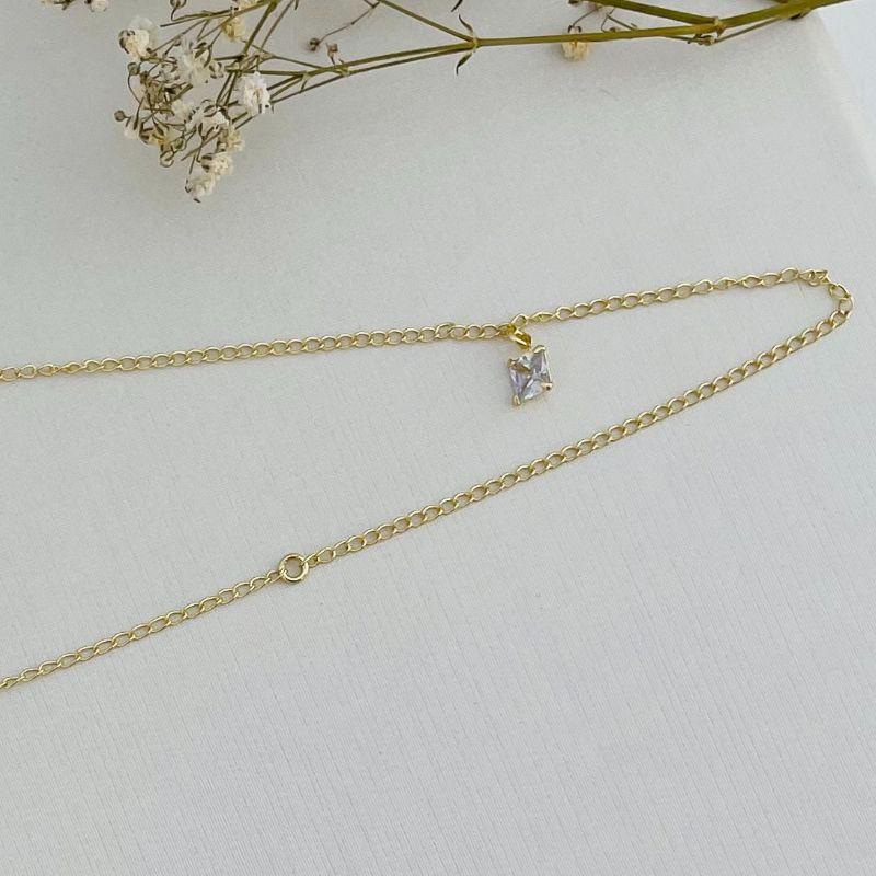 14.0301.1.O - Tornozeleira de elos clássicos com pingente ponto de luz quadrado grande