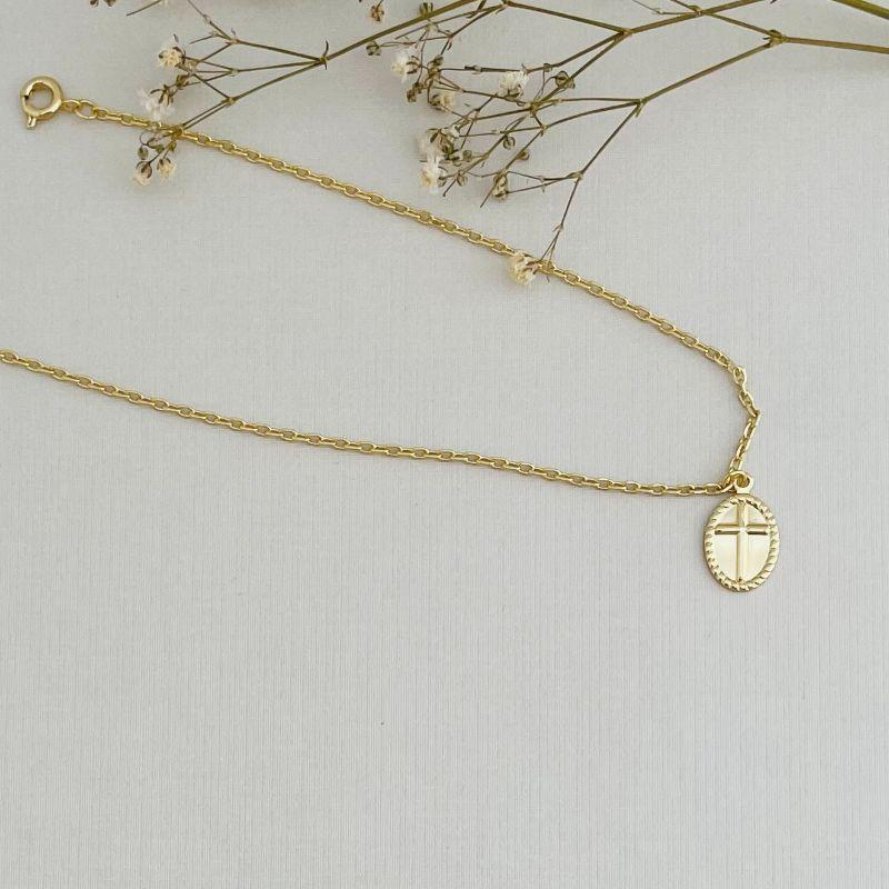 14.0307.0.O - Tornozeleira de elos americanos com pingente oval com cruz lisa