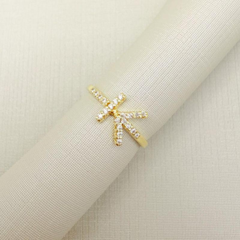 01.0212.1.O - (11) Anel de mindinho com desenho seta e traço cravejados