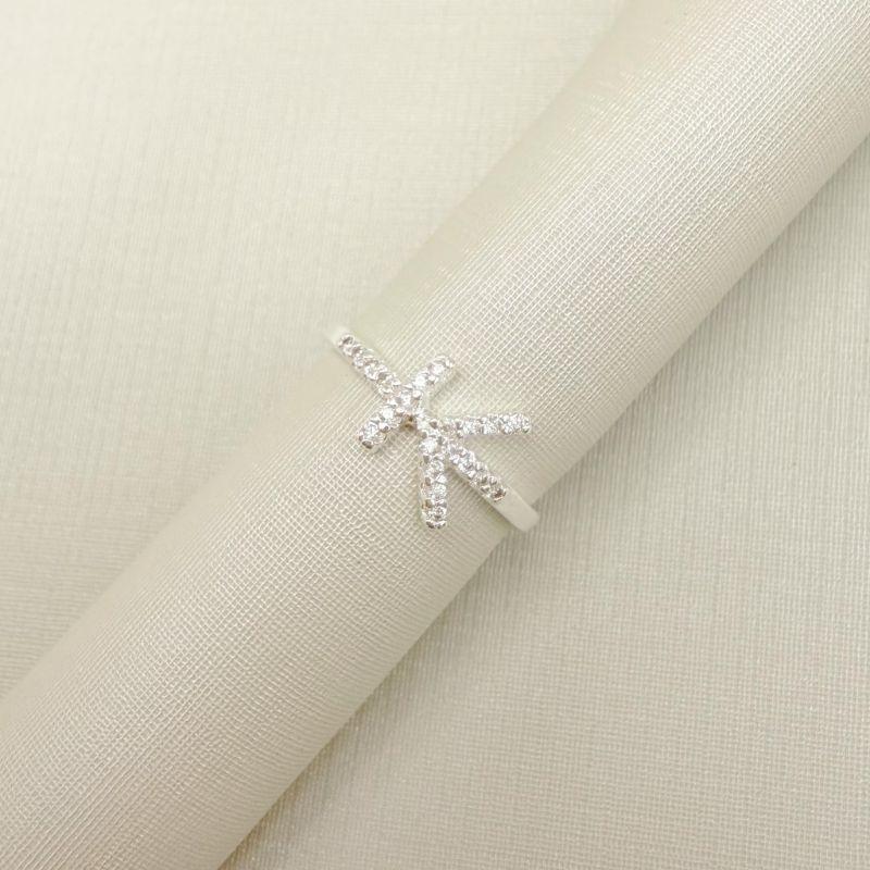 01.0212.1.S - (11) Anel de mindinho com desenho seta e traço cravejados