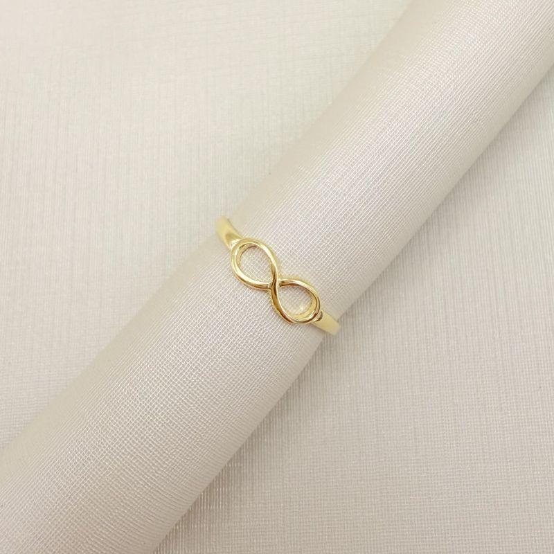 01.0214.0.O - (10) Anel de mindinho de aro fino liso com simbolo do infinito liso