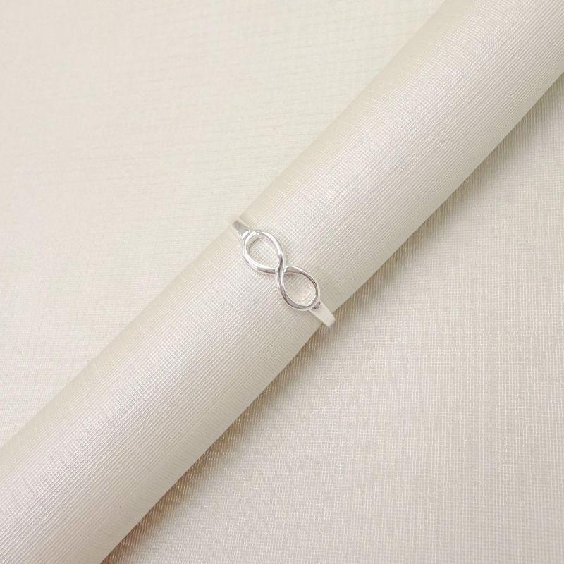 01.0214.0.S - (10) Anel de mindinho de aro fino liso com simbolo do infinito liso