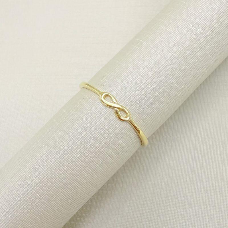 03.2535.0.O - (13) Anel de aro fino com central em infinito liso