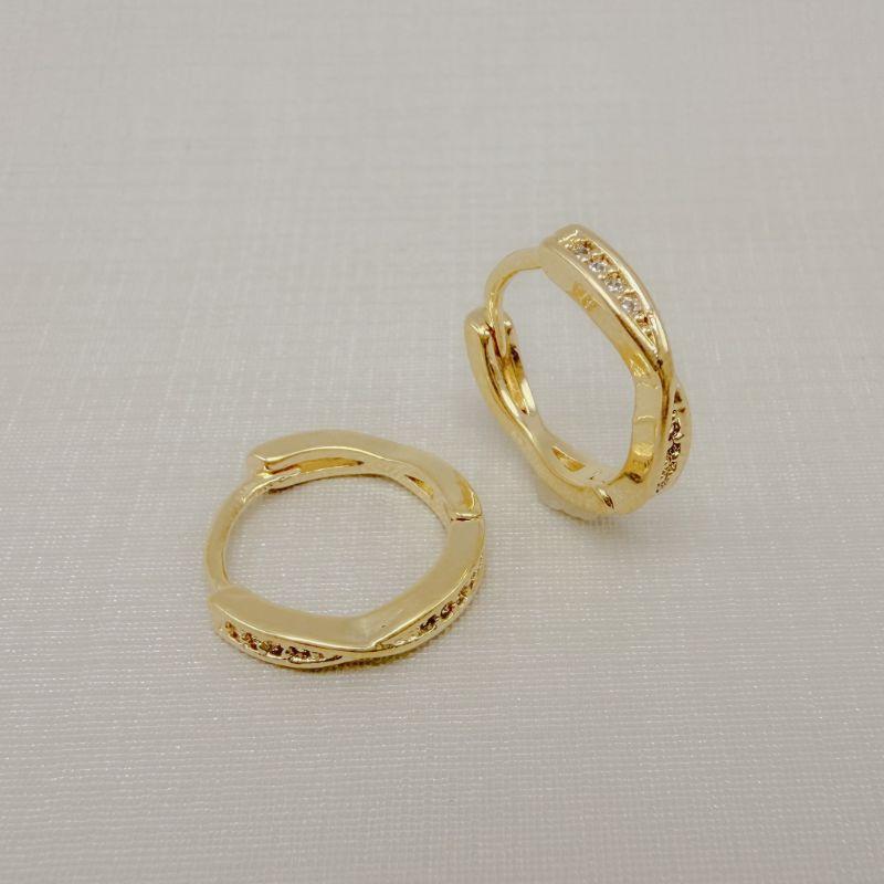 05.3089.1.O - Argola X liso estreito com zircônias entre os traços do X.