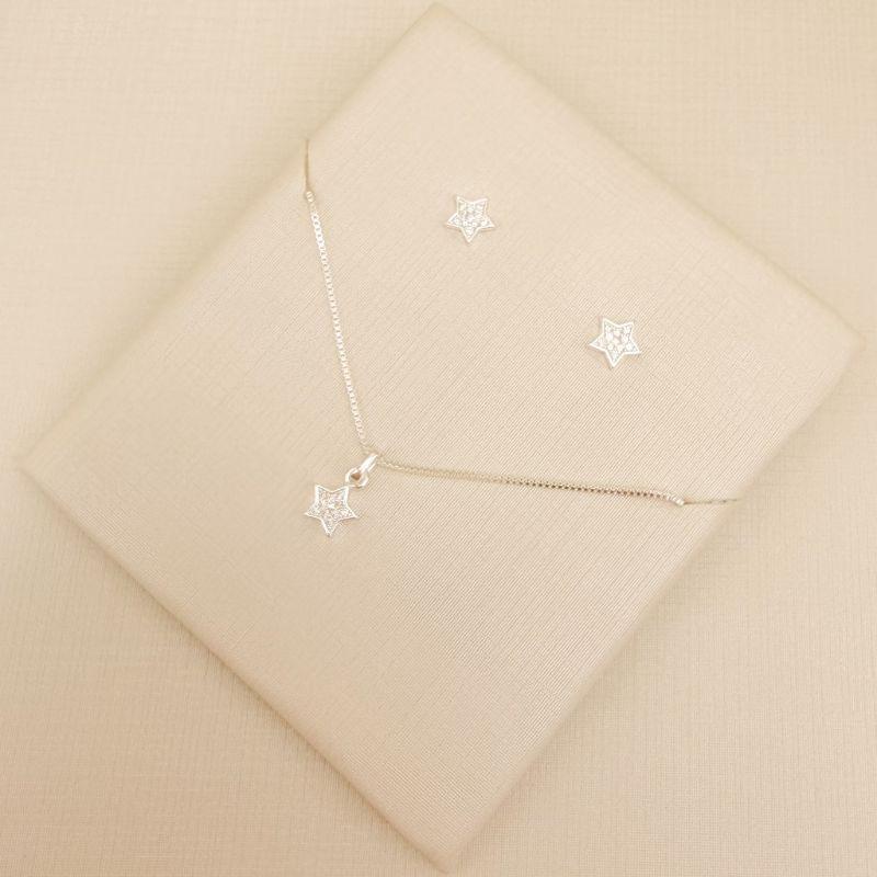 08.0613.1.S - Conjunto estrela 7mm cravejada com mini estrela lisa no centro
