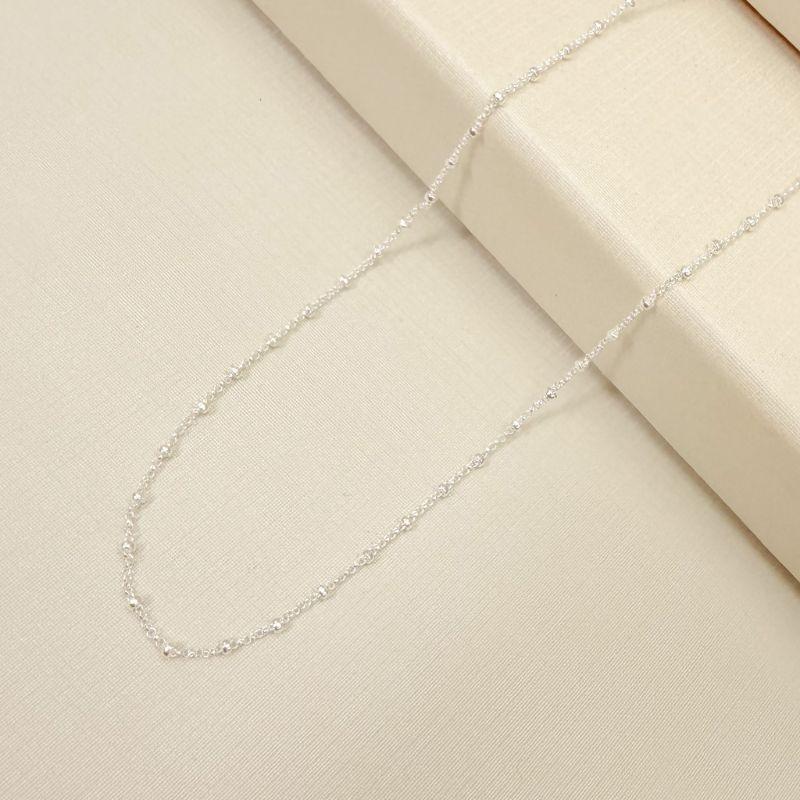 09.2426.0.S - (62cm) Colar de mini elo português 1mm de espessura com rondeis/rondel/bolinha a cada 5mm.