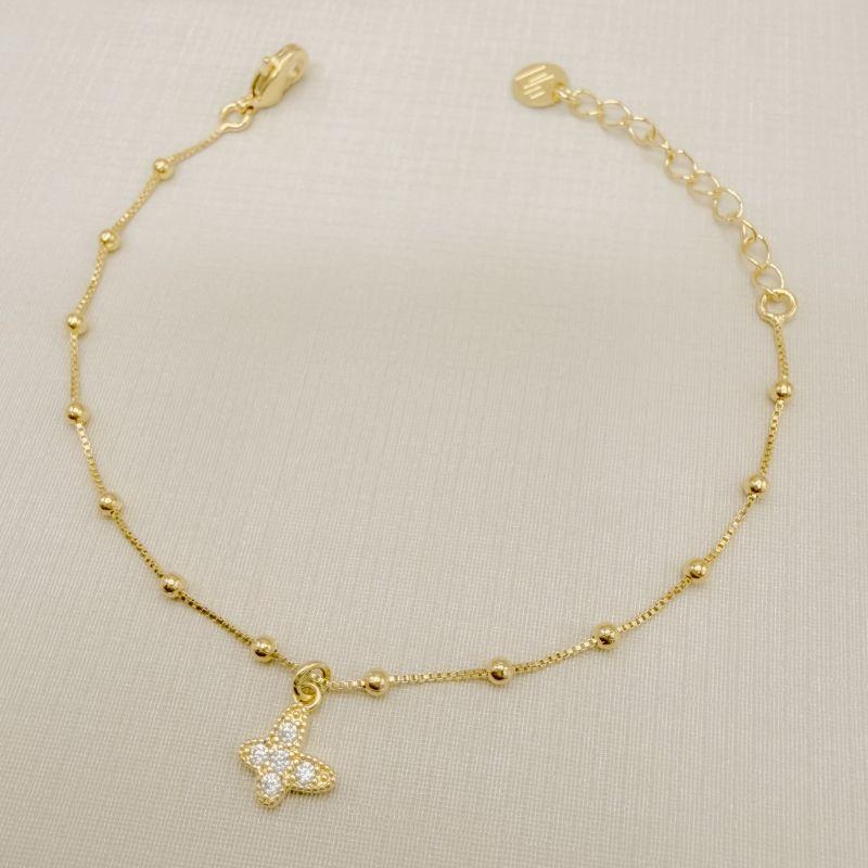 12.2238.1.O - Pulseira infantil veneziana com bolinhas e pingente de mini borboleta cravejada.