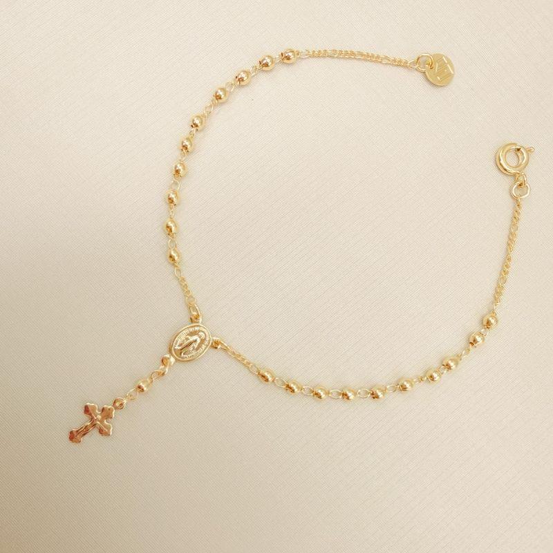 12.2254.0.O - Pulseira terço de bolinhas lisas.