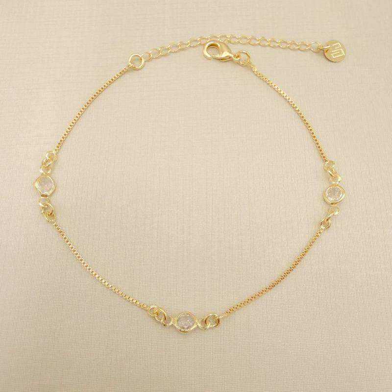 12.2266.1.O - Pulseira insp. modelo Tiffany com pontos de luz e corrente veneziana entre os pontos.