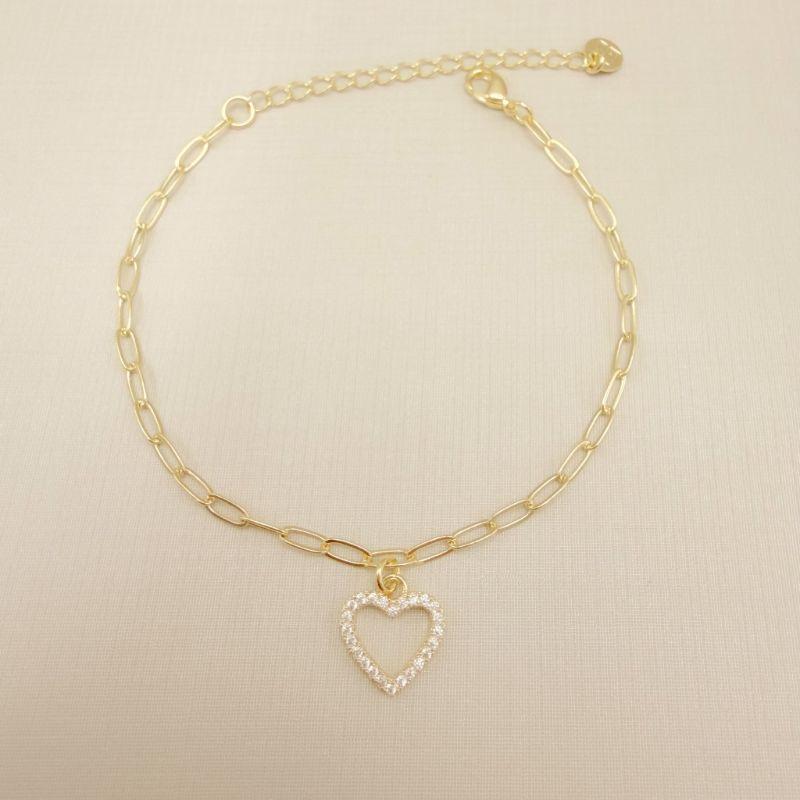 12.2272.1.O - Pulseira pingente de silhueta de coração cravejado, elo americano longo 2,5mm de espessura.