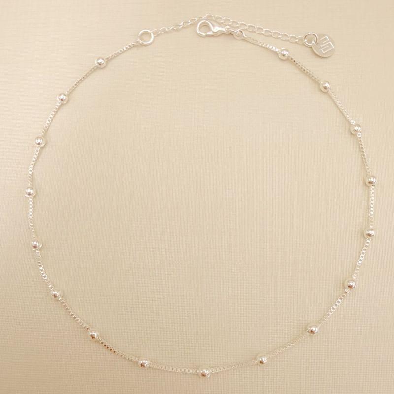 14.0313.0.S - Tornozeleira de veneziana com bolinhas lisas espaçadas