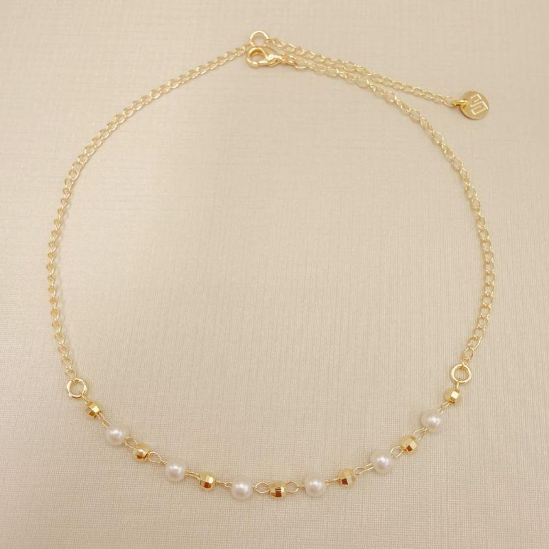 14.0316.15.O - Tornozeleira bolinhas disco intercaladas com pérola lisas