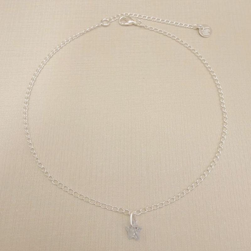 14.0319.1.S - Tornozeleira de elos clássicos lisos com pingente de ponto de luz em estrela