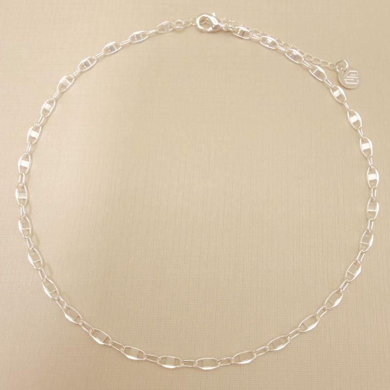 14.0330.0.S - Tornozeleira elo insp. Gucci formato fígaro 1x1, interligado por elo longo fino.