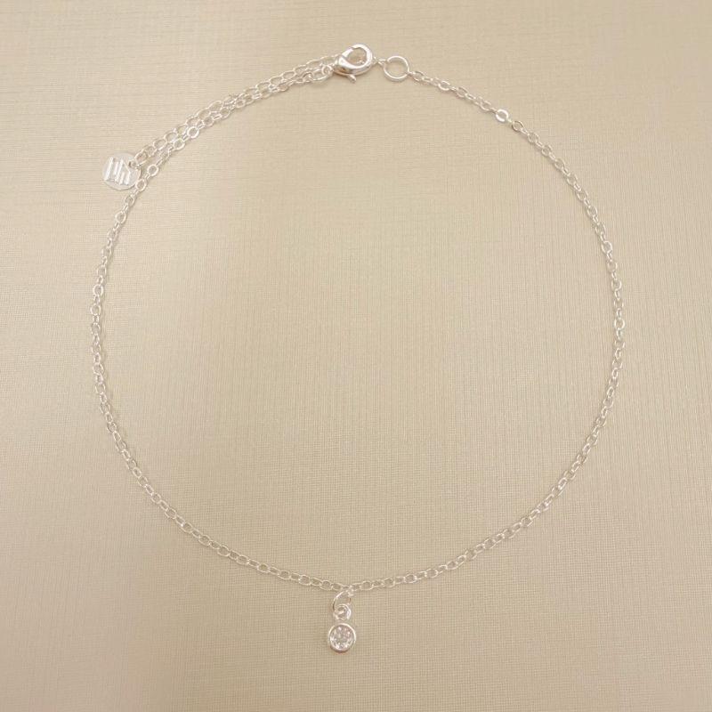 14.0332.1.S - Tornozeleira elo americano 1,6mm com pingente ponto de luz caixa luxo inglesa