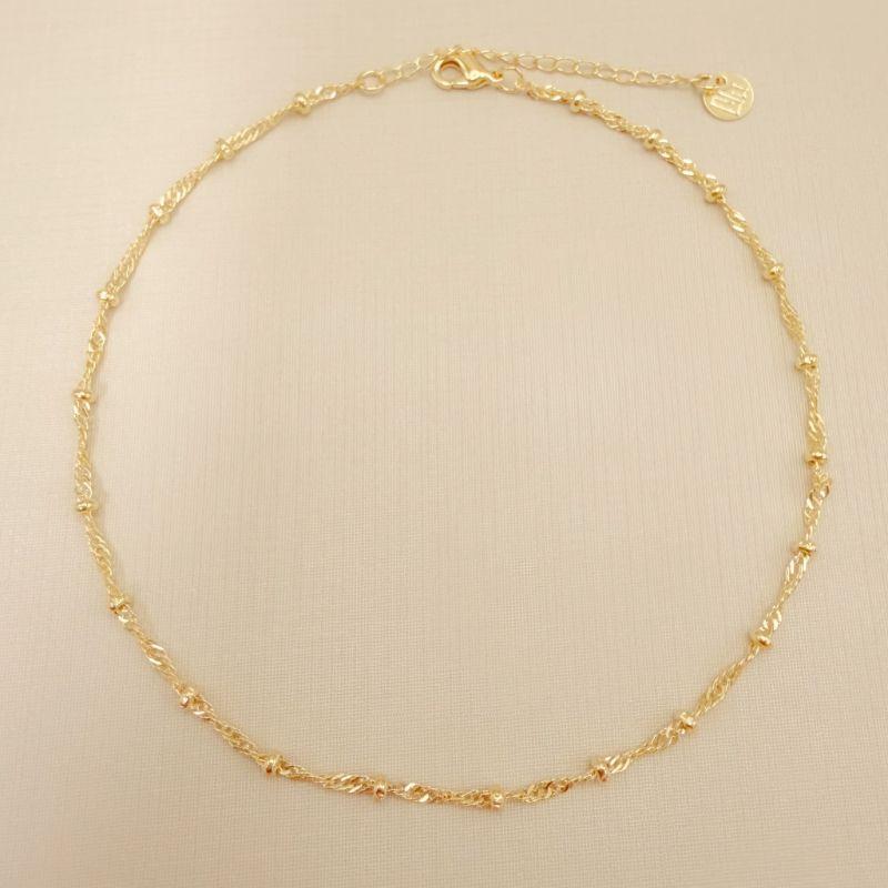 14.0334.0.O - Tornozeleira malha singapura com rondéis/rondel/bolinhas.