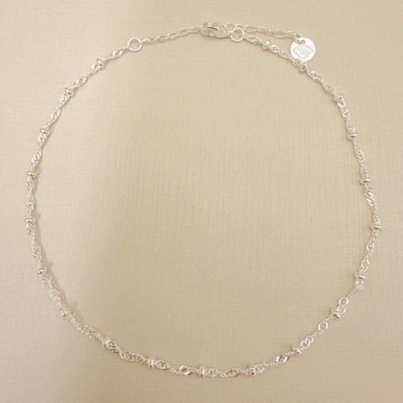 14.0334.0.S - Tornozeleira malha singapura com rondéis/rondel/bolinhas.