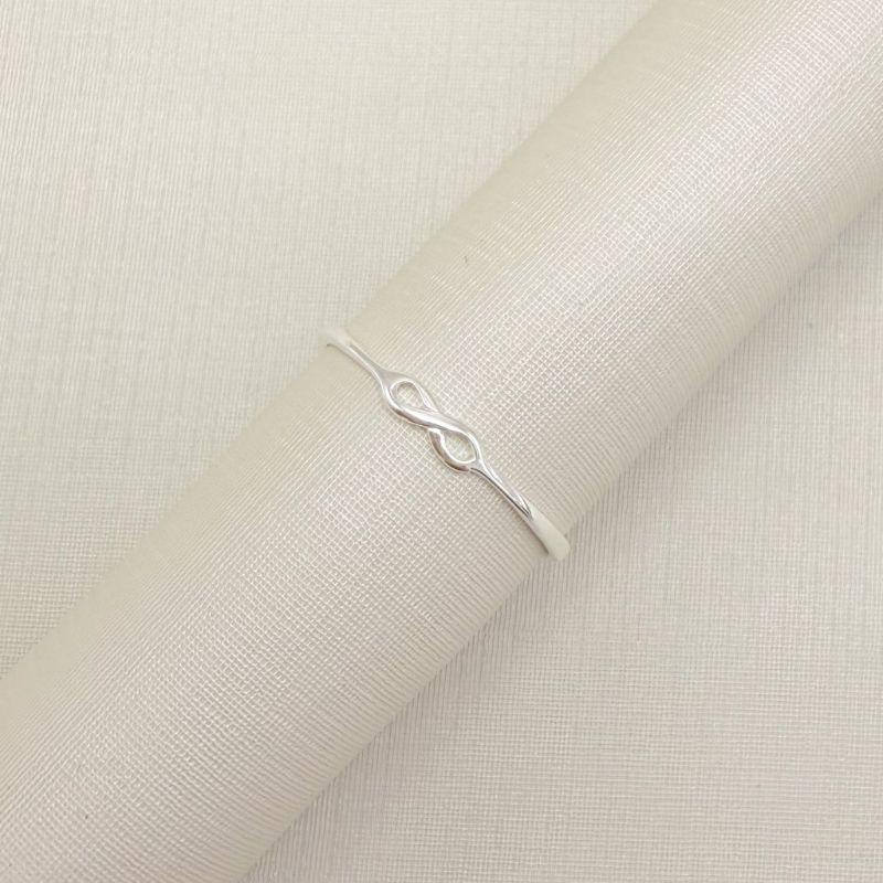 03.2535.0.S - (20) Anel de aro fino com central em infinito liso