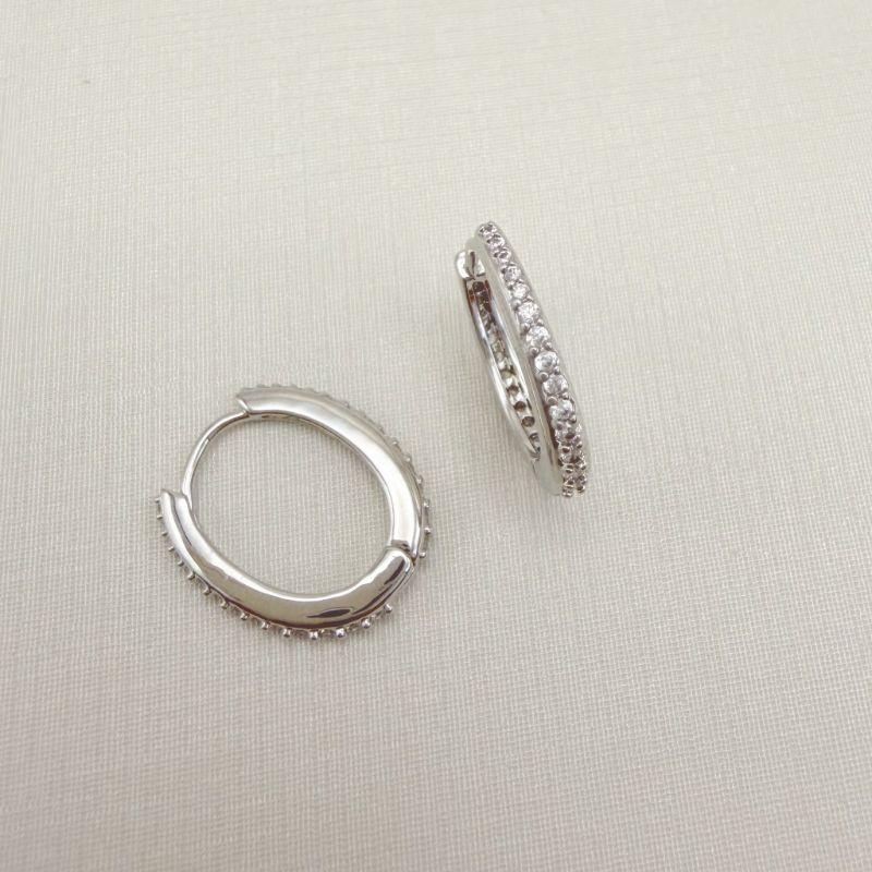 05.3109.1.B - Argola oval com uma coluna de cravação frente e atrás crescente