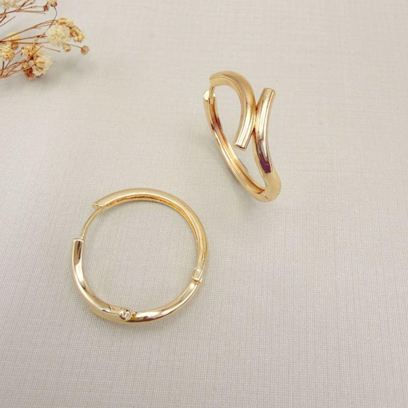 05.3115.0.O - Argola maxxi em tubo com parte frontal em onda passada